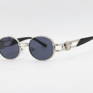 Retro oval sunglasses with dark lenses, silver frame and Medusa head detail on the temple